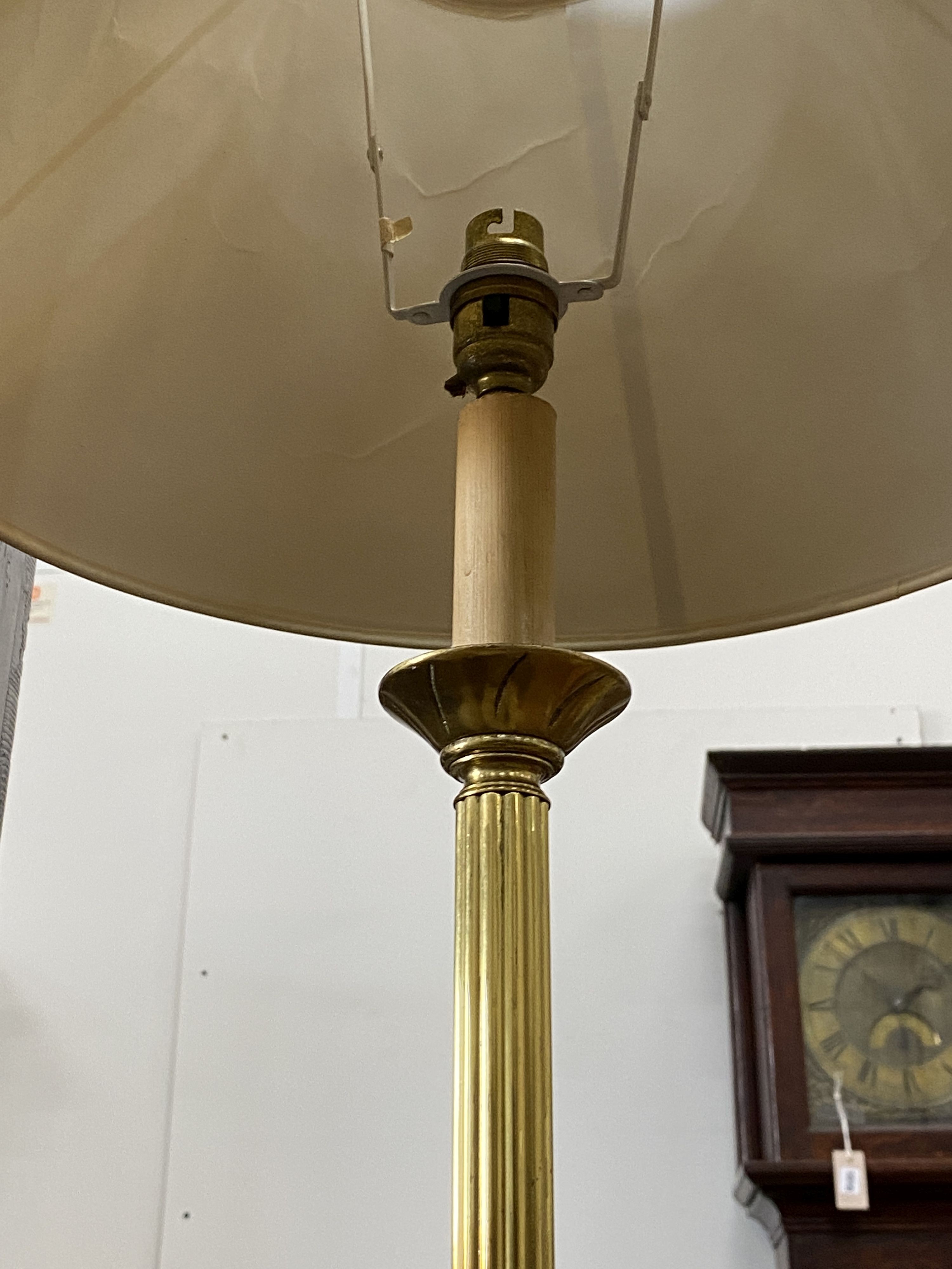 A brass lamp standard, height 150cm